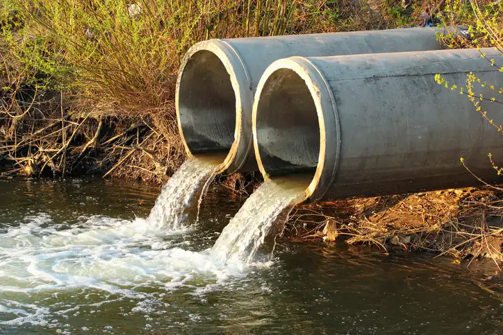 Contaminated water draining from pipe at Camp Lejeune